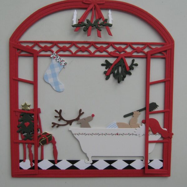 "Rudolph in bathtub" papercut mobile, 6.5" x 5.5"  1 left