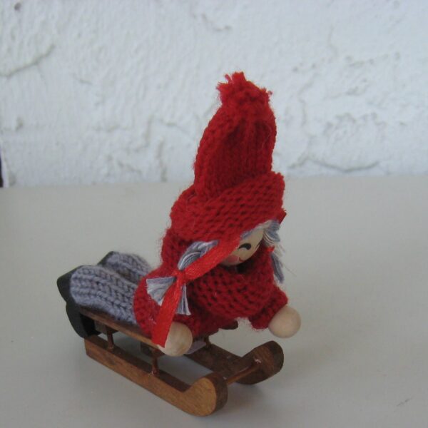 Tomte girl on sled  3" x3"  Made in Sweden