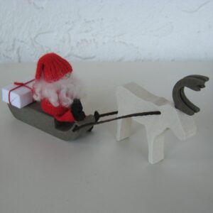 Tomte on sled with reindeer 7.5" long  3" tall  Made in Sweden