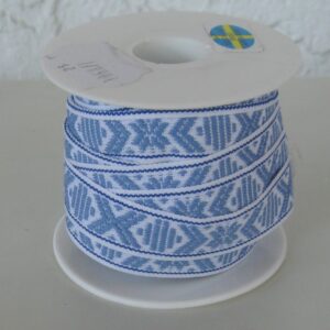 White ribbon with light blue pattern sold by yard