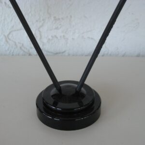 A 2-hole plastic holder for table flags