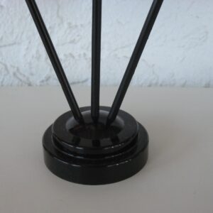 A 3-hole plastic holder for table flags
