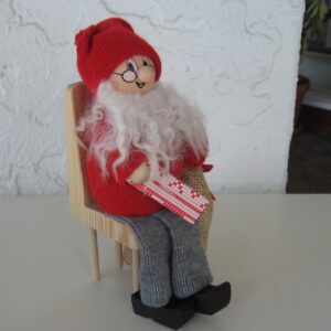 Tomte in chair w/presents  8"  Made in Sweden
