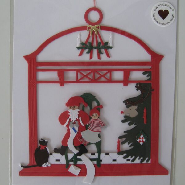 Santa w/child on chair papercut  7" x 6"  Made in Denmark by Oda Wiedbrecht