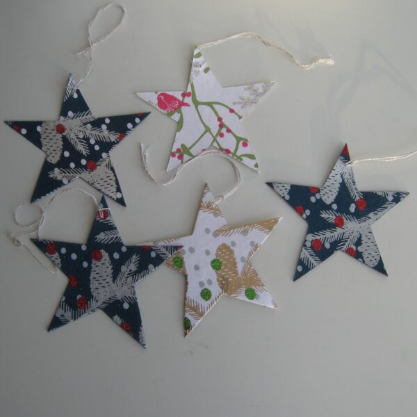 Flat paper stars (5)   Pluto of Sweden  4" x 4"  printed on both sides