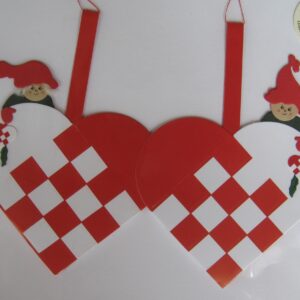 2 red/white hearts w/nissar paper cuts 5" x3" Made in Denmark by Oda Wiedbrecht